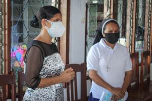 Prezidente Fundasaun Centro Quesadhip Ruak, Isabel Ferreira ho Reprezentante Madre Madre Dominikana, Flávia Mendonca dada lia hela iha Bidau mota Klaran, kuarta (06/10).