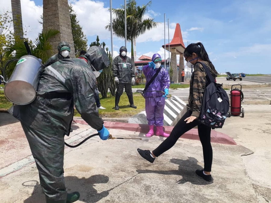 East Timor Students returned from Indonesia arrived in Dili Airport have to disinfected (29/3) 