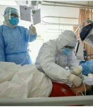 Medical team examine a suspect of Covid-19