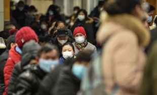 Xines sira uza maskar iha Wuhan